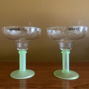 Pair of plastic Midori margarita glasses